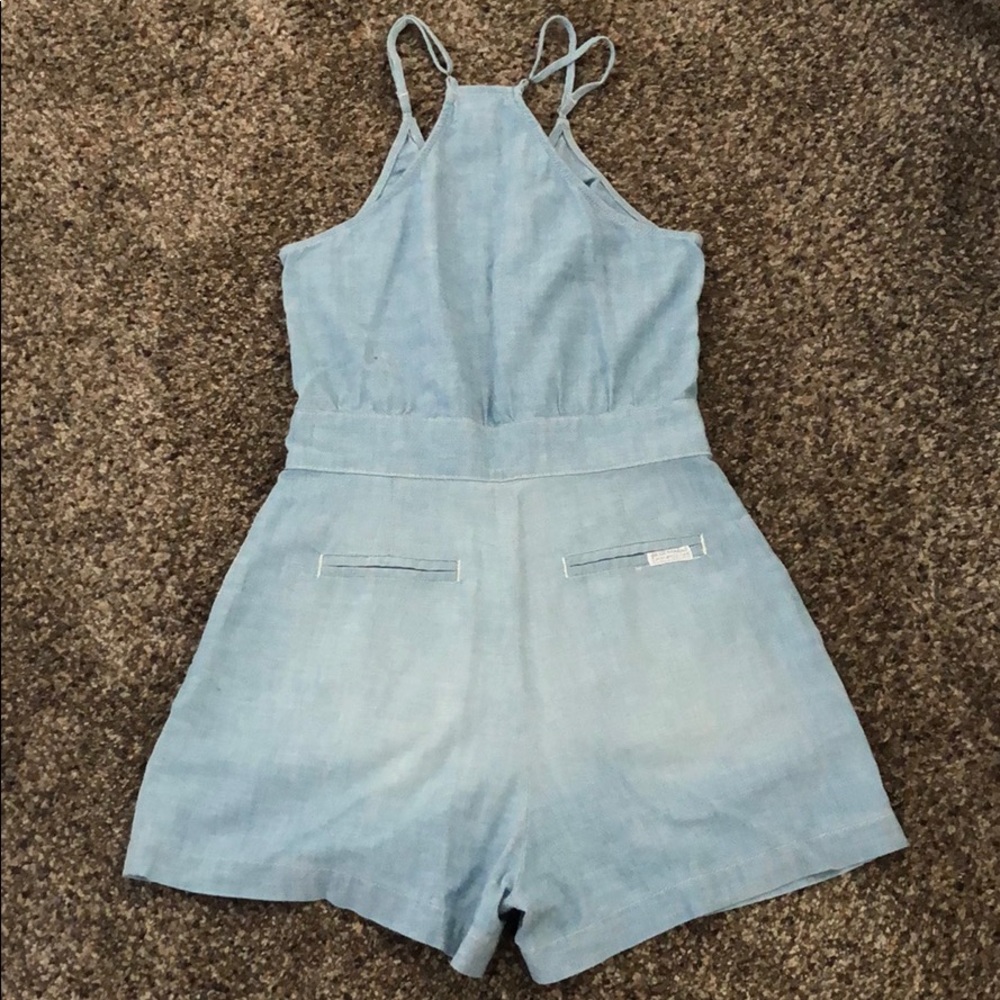 Short jumpsuit with front zipper